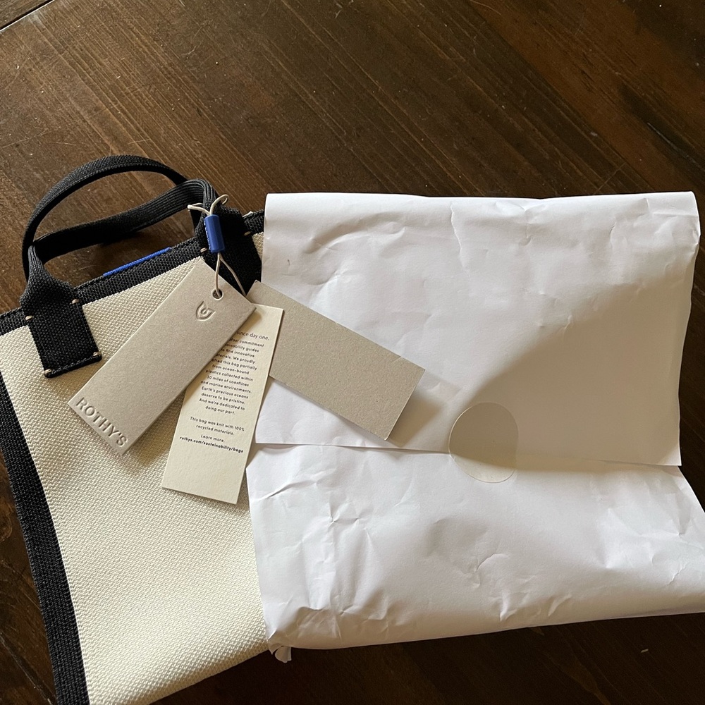 Rothy’s Black and White Canvas Piano Bag